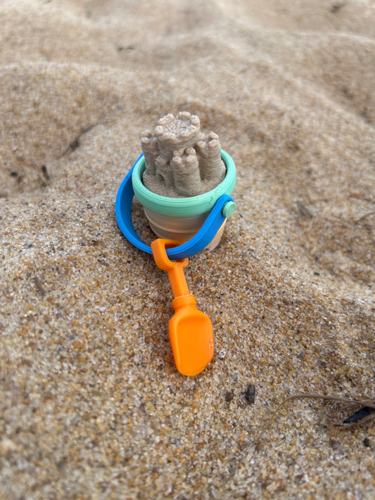 Mini Sand Castle in Bucket Clicker