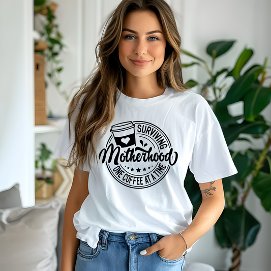 Surviving Motherhood One Coffee At A Time Tee